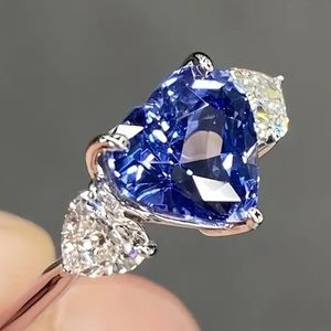 Elegant Blue and Silver Heart-Shaped Ring
